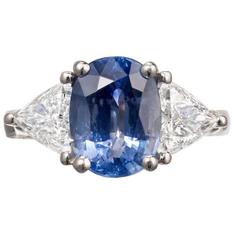 AJD Bague classique scintillante à trois pierres en saphir bleu et