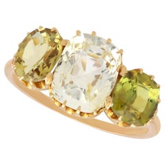 3,90 Karat gelber Saphir, 2,65 Karat Chrysoberyll, Trilogie-Ring aus 18-karätigem Gelbgold