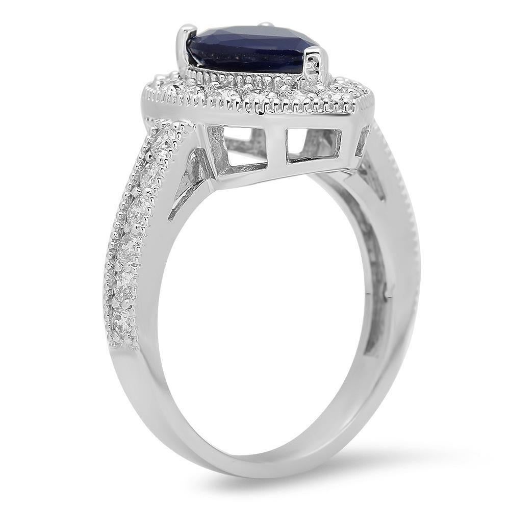 3.90 Carats Natural Blue Sapphire and Diamond 14K Solid White Gold Ring

Total Blue Sapphire Weight is: Approx. 3.00 Carats

Natural Sapphire Measures: Approx. 10.00 x 7.00mm

Sapphire treatment: Diffusion

Natural Round Diamonds Weight: Approx.