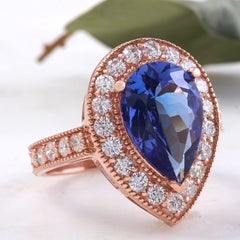 3.90 Carat Natural Tanzanite and Diamond 14 Karat Solid Rose Gold Ring