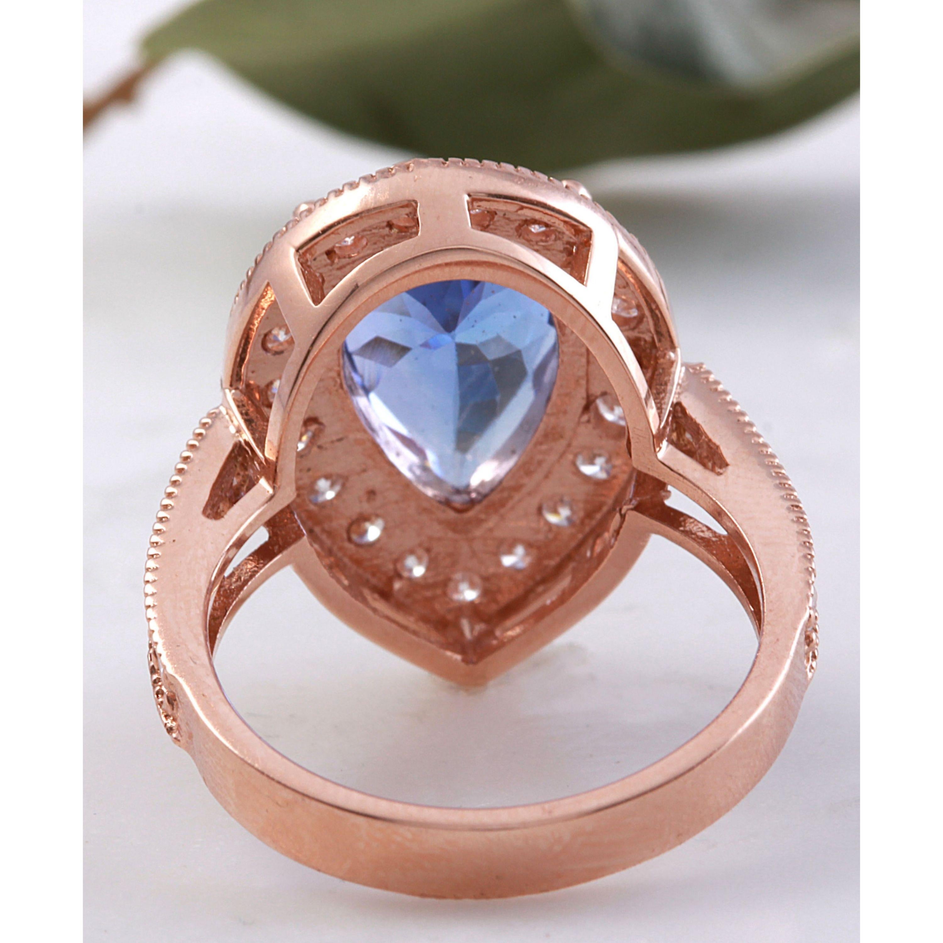 Women's 3.90 Carat Natural Tanzanite and Diamond 14 Karat Solid Rose Gold Ring For Sale