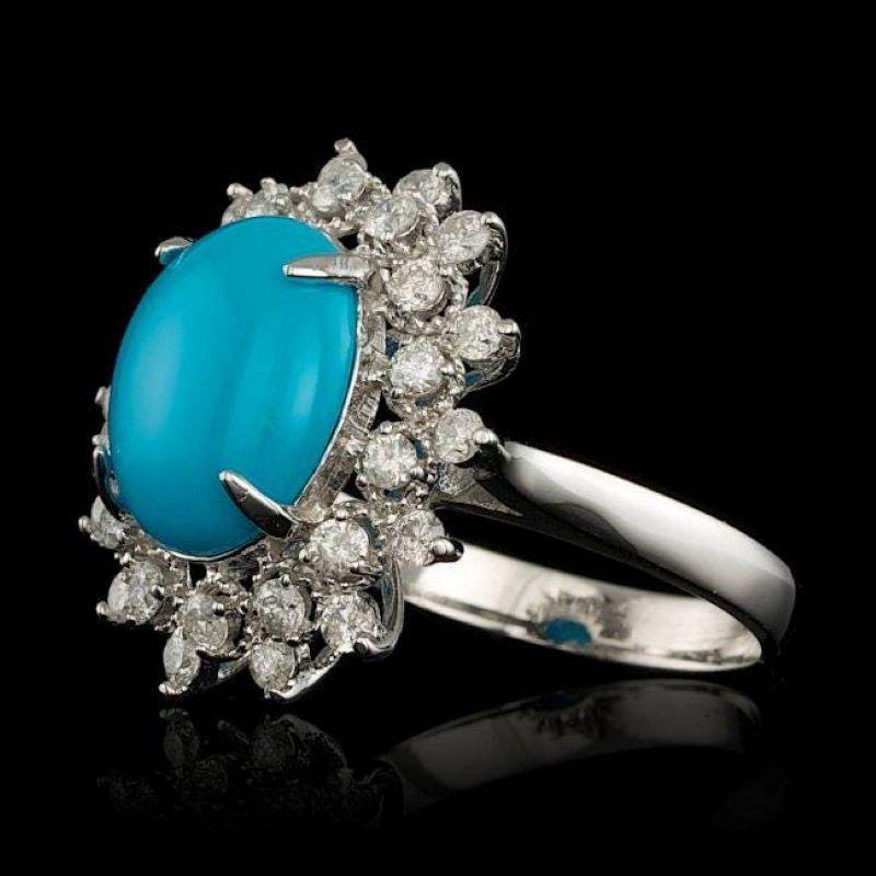 3.90 Carats Impressive Natural Turquoise and Diamond 14K Solid White Gold Ring

Total Natural Oval Turquoise Weight is: Approx. 3.20 Carats 

Turquoise Measures: 12.00 x 10.00mm 

Natural Round Diamonds Weight: Approx. 0.70 Carats (color G-H /