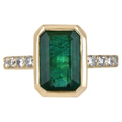 3.90tcw 18K Fine Quality Emerald Cut Emerald & Diamond Accent Ring