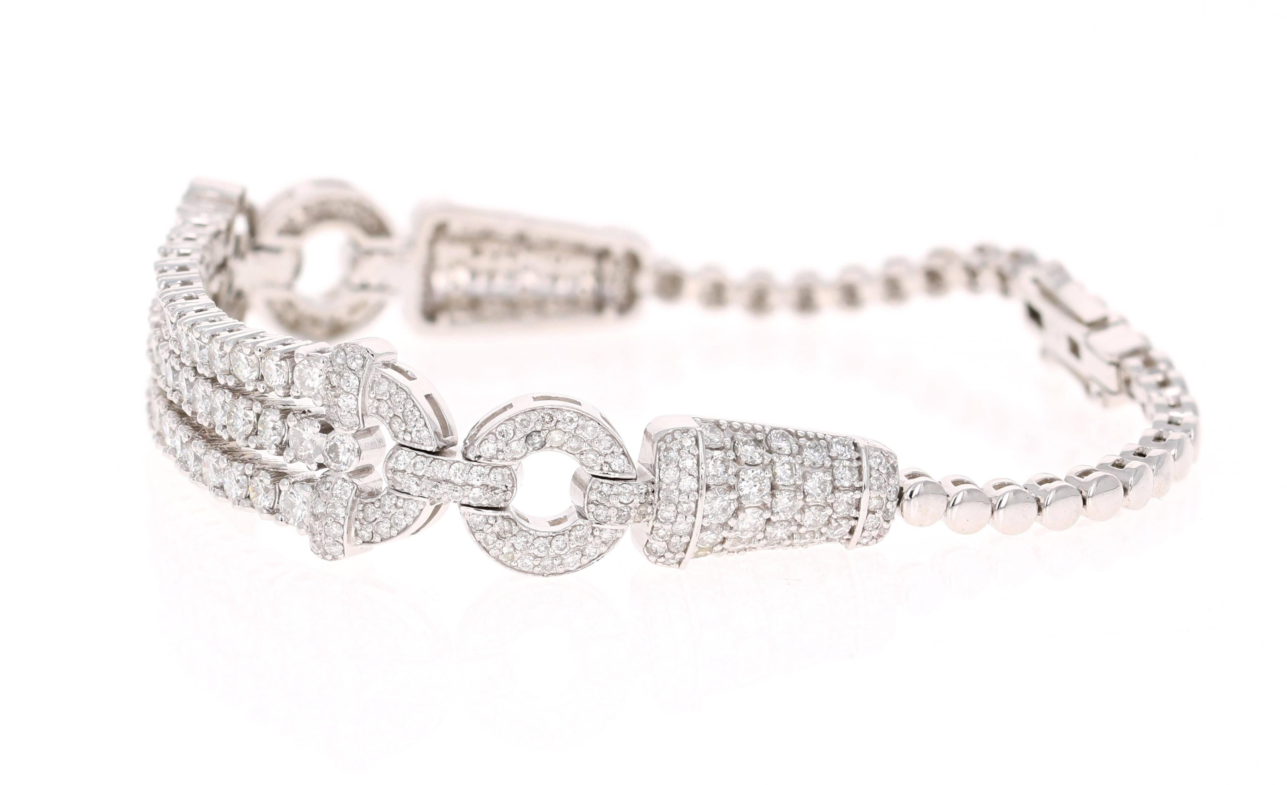 Stunning 3.91 Carat Diamond White Gold Art Deco Bracelet.  This gorgeous piece has 275 Round Cut Diamonds that weigh a total of 3.91 carats. It is casted in 14K and weighs approximately 18.0 grams. 

The bracelet is 7-inches long and has a very