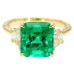 Bague en or 18k avec émeraude et diamant de 3,91 carats