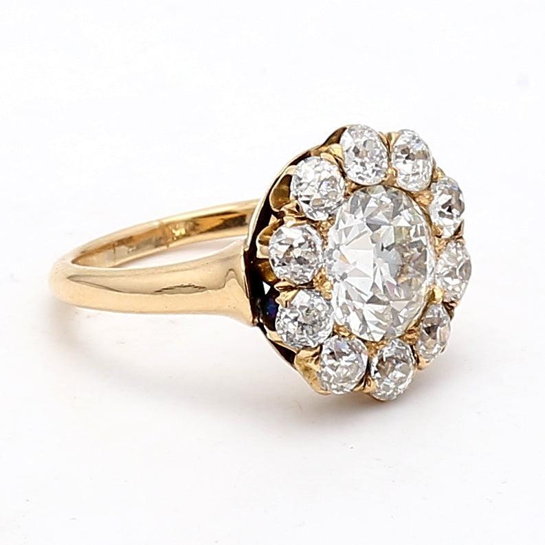 Title:
3.91 Carat Old European Cut I VVS1-VVS2 Diamond 18 Karat Yellow Gold Cluster Ring


Style:
Cluster


Metal:
18 Karat Yellow Gold


Gemstone 1:
1.8 Carat Diamond


Number of Stones:
10


Color:
I


Clarity:
VVS1


Shape:
Old European