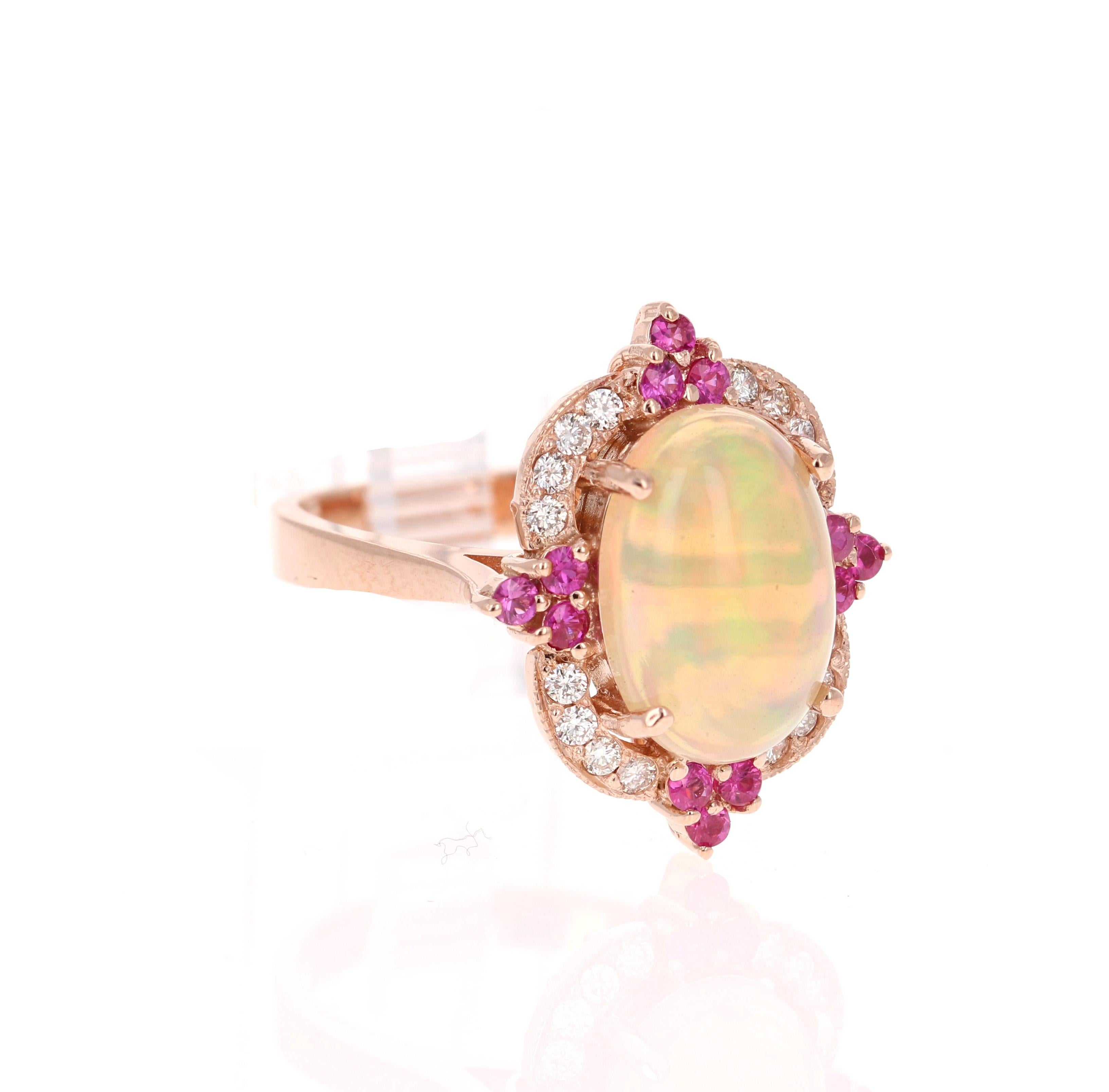 

Unique and beautifully designed ring that can be a masterpiece to anyone's jewelry collection

This ring has a 3.26 Carat Oval Cut Ethiopian- Origin Opal and is surrounded by 12 Pink Sapphires that weigh 0.38 Carats and is further embellished with