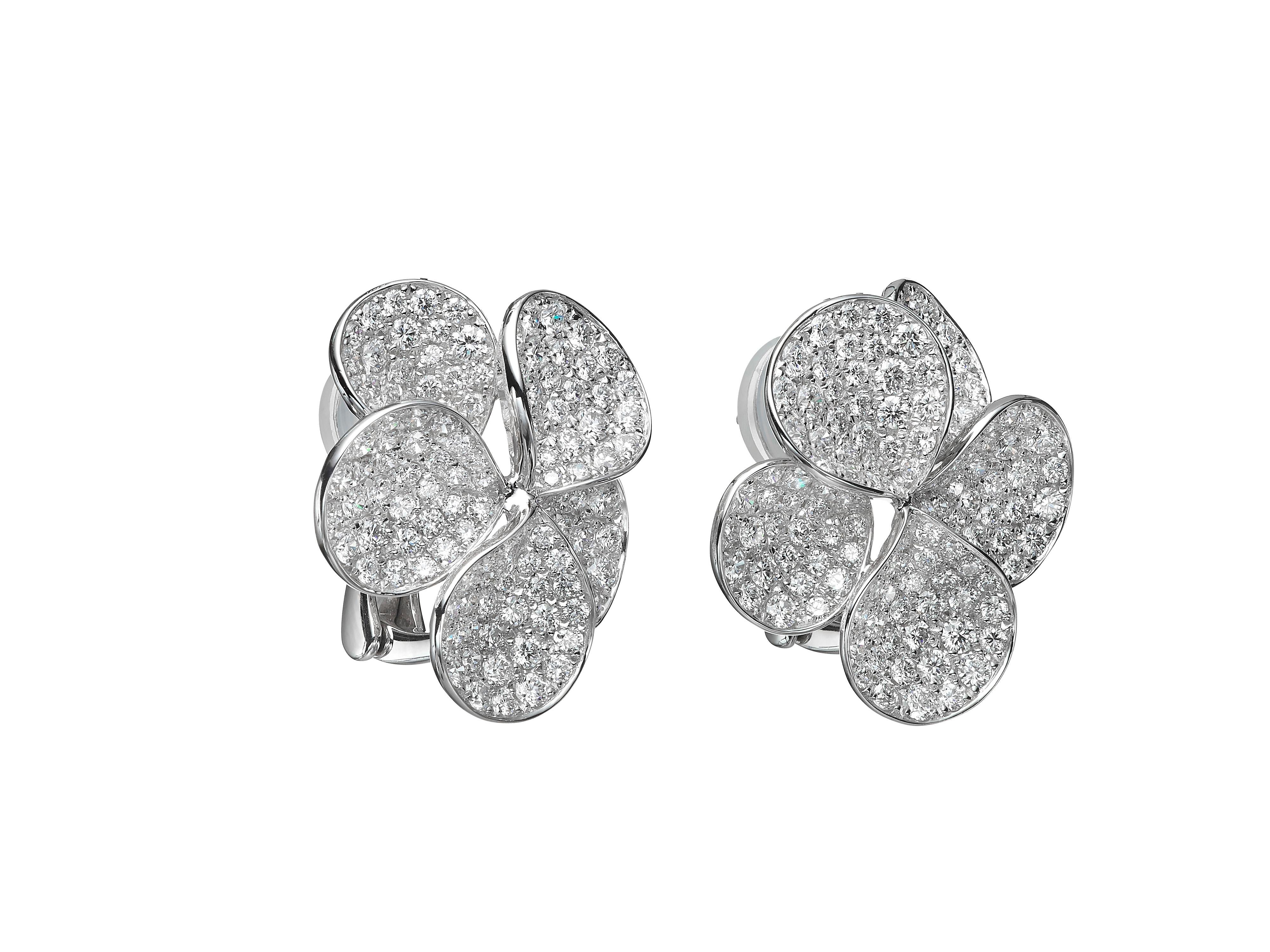 3.91 carats of pavé white diamonds form petal shaped stud earrings.  Set in 18K white gold.

Composition: 
18K White Gold
288 Round Diamonds: 3.91 carats 
Diamond Quality: VS, G/H 

About Butani: 
Family-run high jewellery house Butani combines the