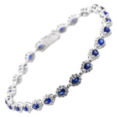 Bracelet tennis en platine serti de saphirs naturels et de diamants de 3,91 carats