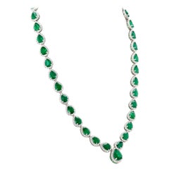 39.14ctw Emerald and 9.70ctw Diamond 18K White Gold Necklace