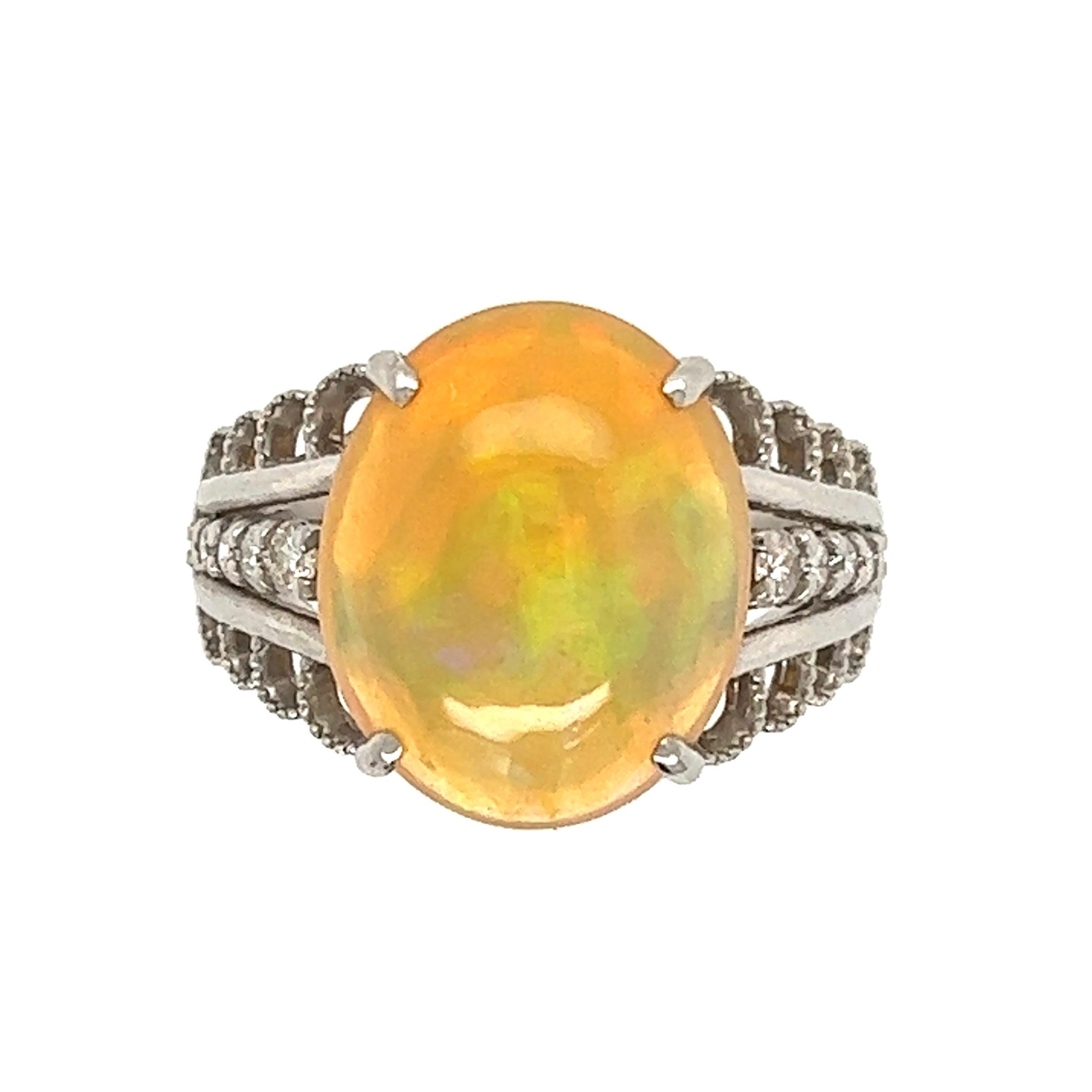 3.92 Carat Jelly Opal and Diamond Platinum Ring In Excellent Condition For Sale In Montreal, QC