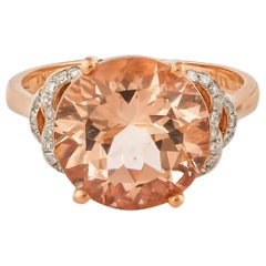 Bague en or rose 18 carats avec diamants et morganite de forme ronde de 3,92 carats