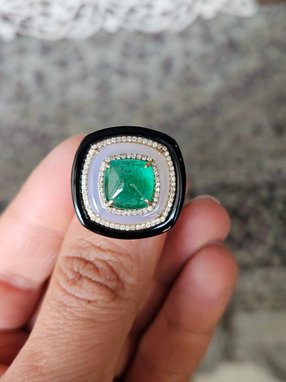 A very gorgeous and beautiful, one of a kind. Emerald, Chalcedony & Black Onyx Cocktail Ring set in 18K Yellow Gold & natural Diamonds. The weight of the Emerald Sugarloaf is 3.92 carats. The Emerald is completely natural, without any treatment and