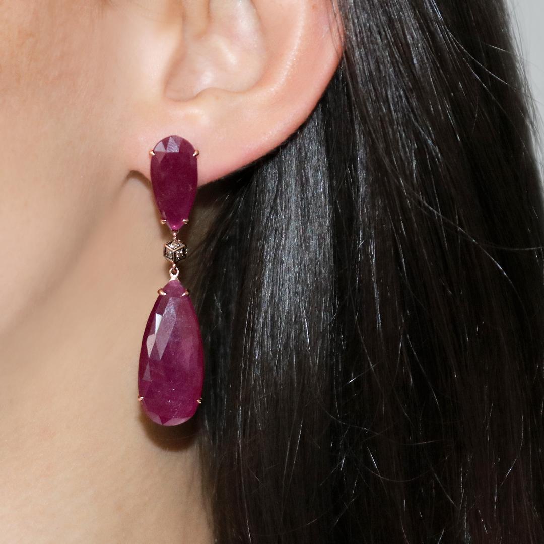 One of a kind pear ruby earrings with champagne diamond Brillante element set in 18kt rose gold. 

Clean lines, absence of metal and great proportions make this pair of ruby earring a delight to wear. 

Ruby Slice: Top: 10.14 carats
Ruby Slice