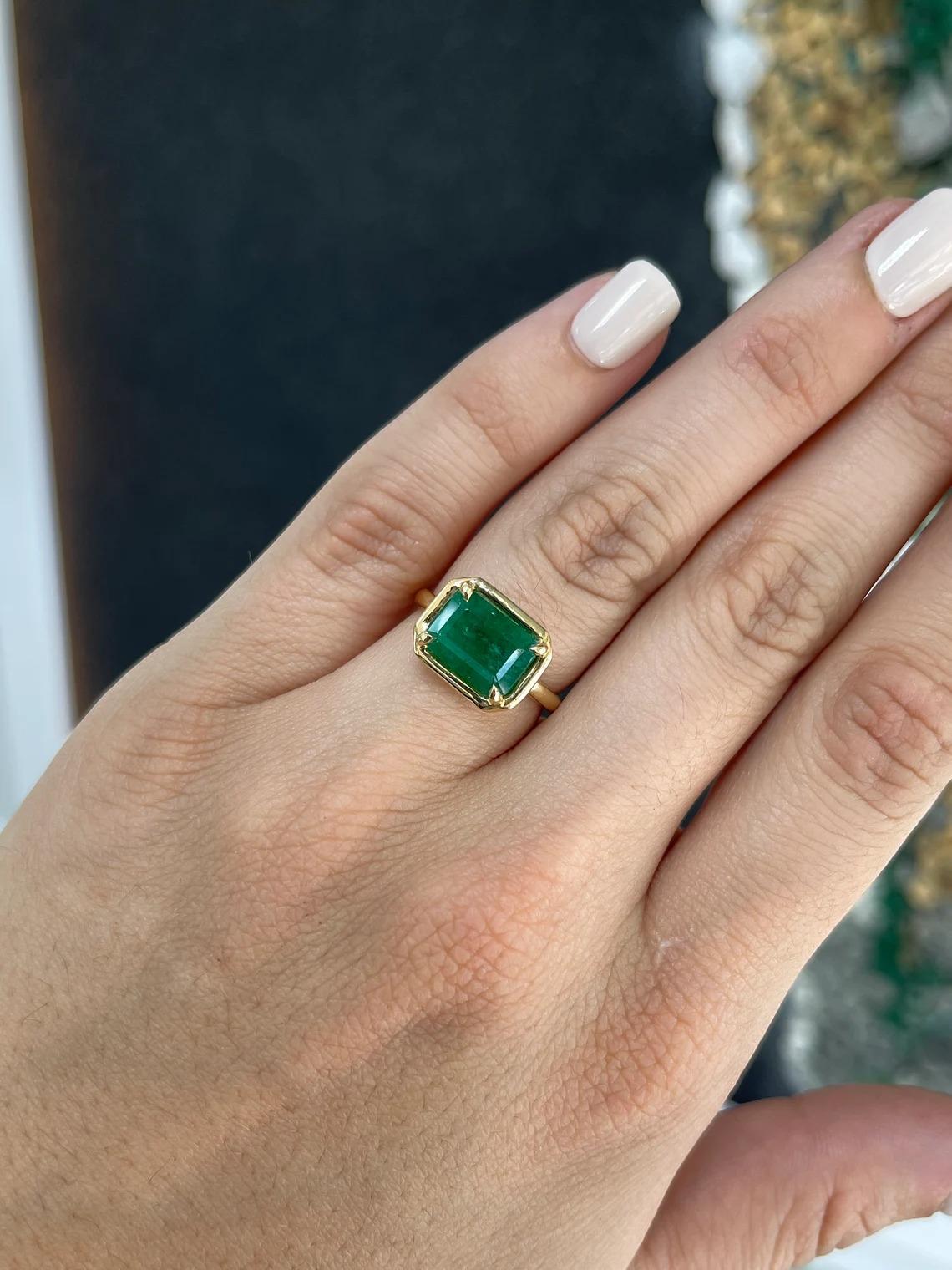 3.92ct 18K Forest Green Emerald Cut Emerald East to West Solitaire Gold Ring For Sale 1