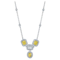 3.92ct Oval & Radiant White & Yellow Diamond Pendant in 18KT Gold