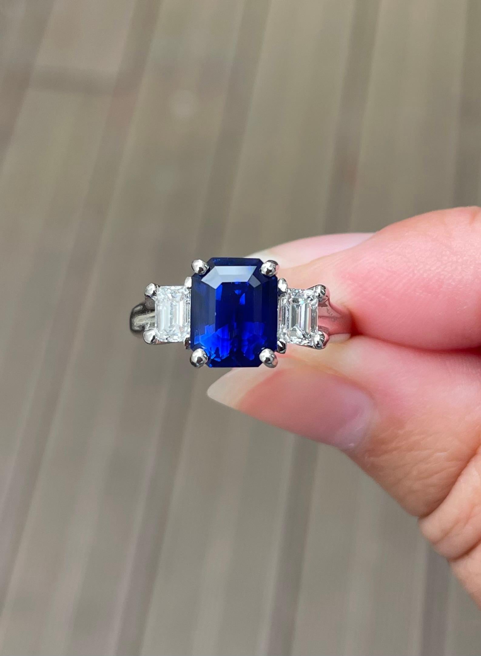 Regal and elegant, this exceptional sapphire would be an important piece in any jewelry collection. The 3.93 carat emerald cut sapphire is a rich, gorgeous cobalt blue. It is quite unusual to find sapphires this shape, making this ring all the more
