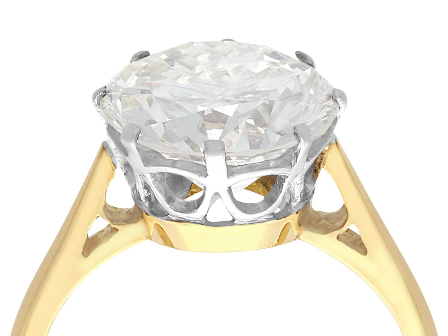 A stunning, fine and impressive vintage 3.93 carat diamond and contemporary 18 karat yellow gold, 18 karat white gold set solitaire ring; part of our diverse jewelry and estate jewelry collections

This stunning contemporary diamond solitaire ring