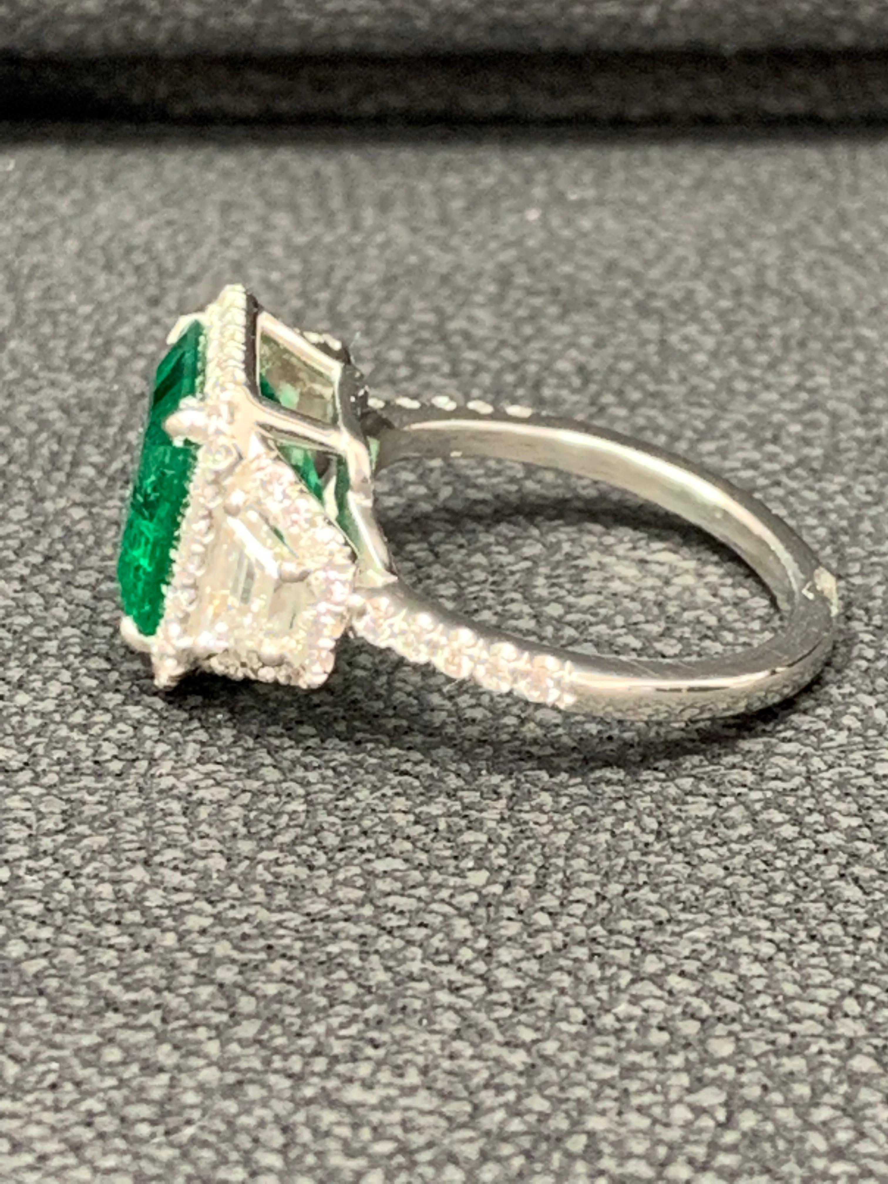 3.93 Carat Emerald Cut Emerald and Diamond Three-Stone Halo Ring in Platinum For Sale 3