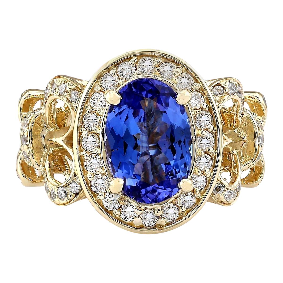 3.93 Carat Natural Tanzanite 18 Karat Yellow Gold Diamond Ring