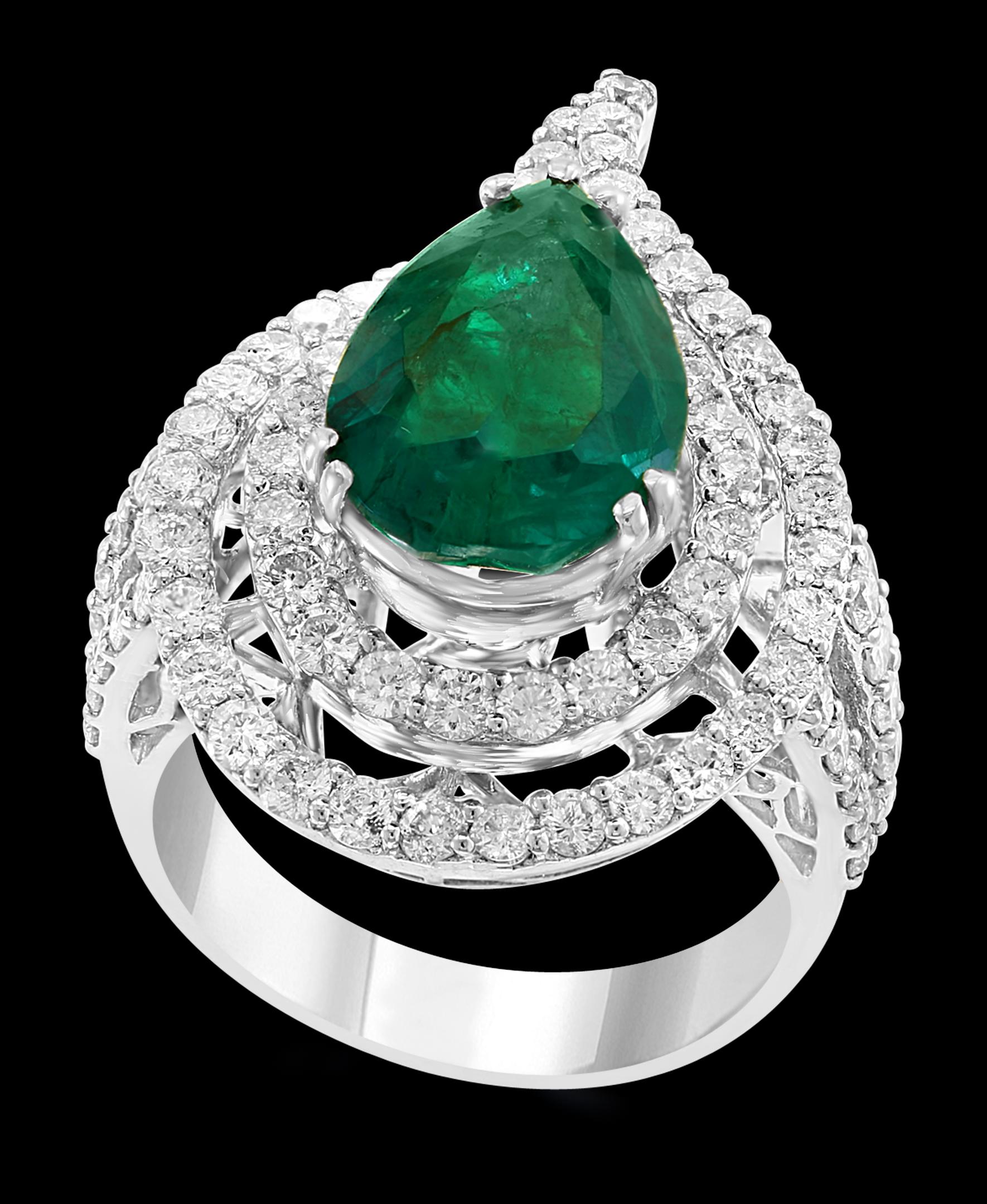 A classic, Cocktail ring 
approximately 3.93 Carat  Colombian Emerald and Diamond Ring, Estate with no color enhancement.
Gold: 18 carat white gold 
Weight: 10 gram
 Diamonds: approximate 3.5 Carat 
Emerald: 3.93 Carat 
Origin : Colombia 
Color: