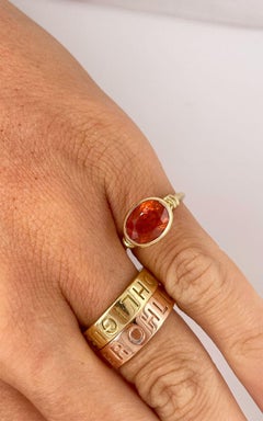 3.93ct Mandarin Garnet "Love knot" Ring in 18ct Yellow Gold