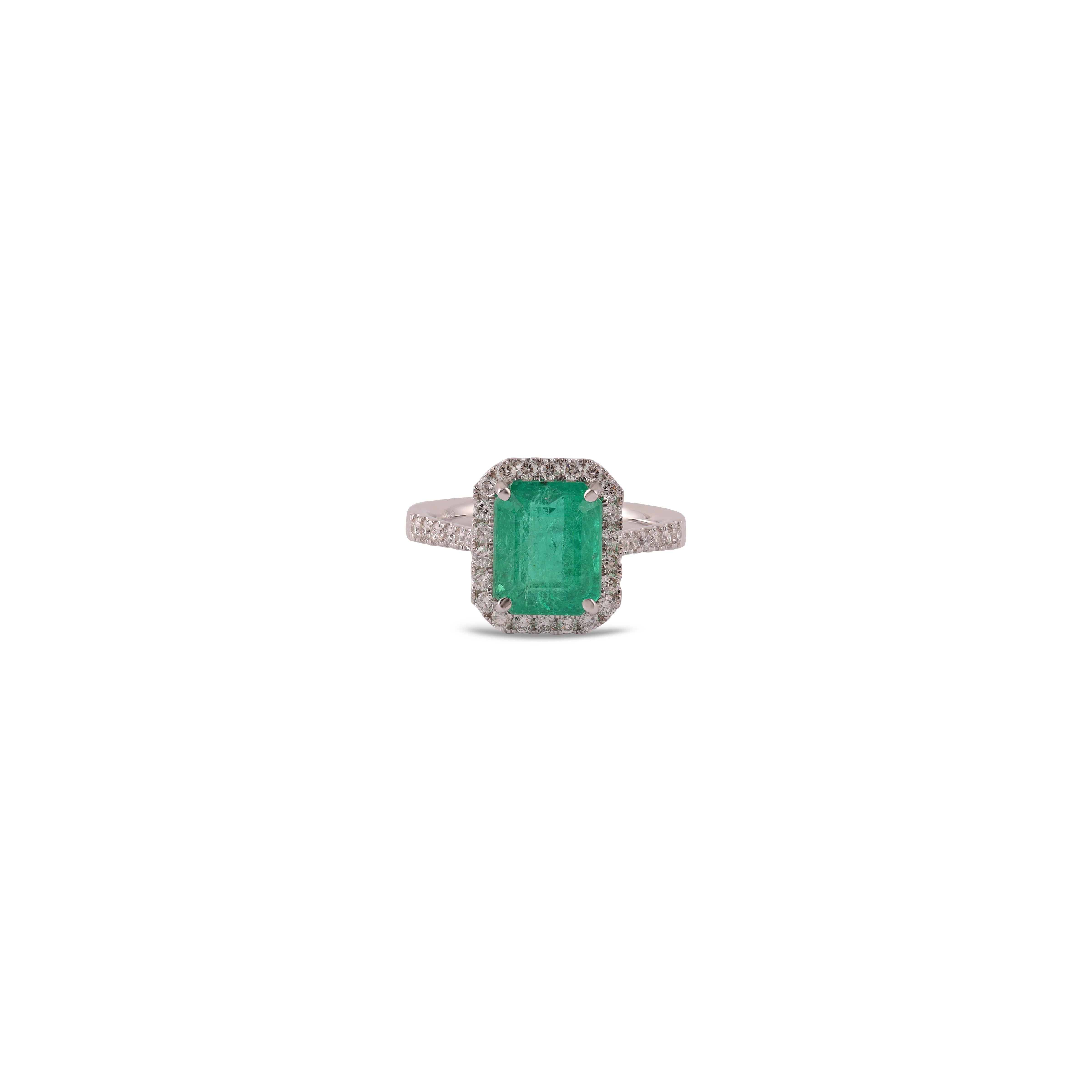 This is an elegant emerald & diamond ring studded in 18k White gold with 1 piece of  Zambian emerald weight 3.94 carat which is surrounded by 36 pieces of round shaped diamonds weight 0.60 carat with this entire ring studded in 18k White gold 

