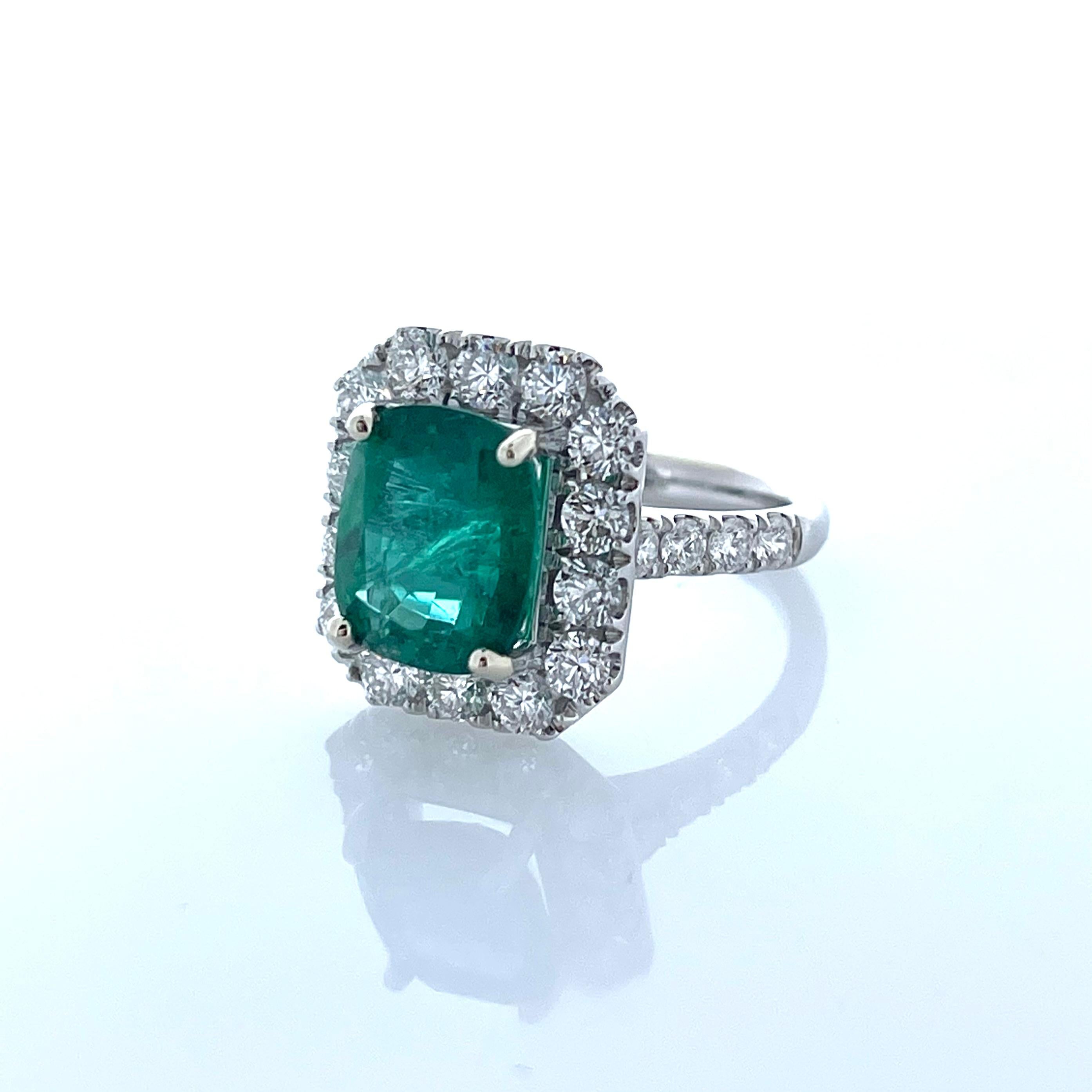This stunning piece features a emerald cushion cut 3.94 carats emerald, Would you look at this beauty! Simple in design, but there is nothing ordinary about the gorgeous color of this breathtaking green emerald ring. The 1.86 carat total weight of