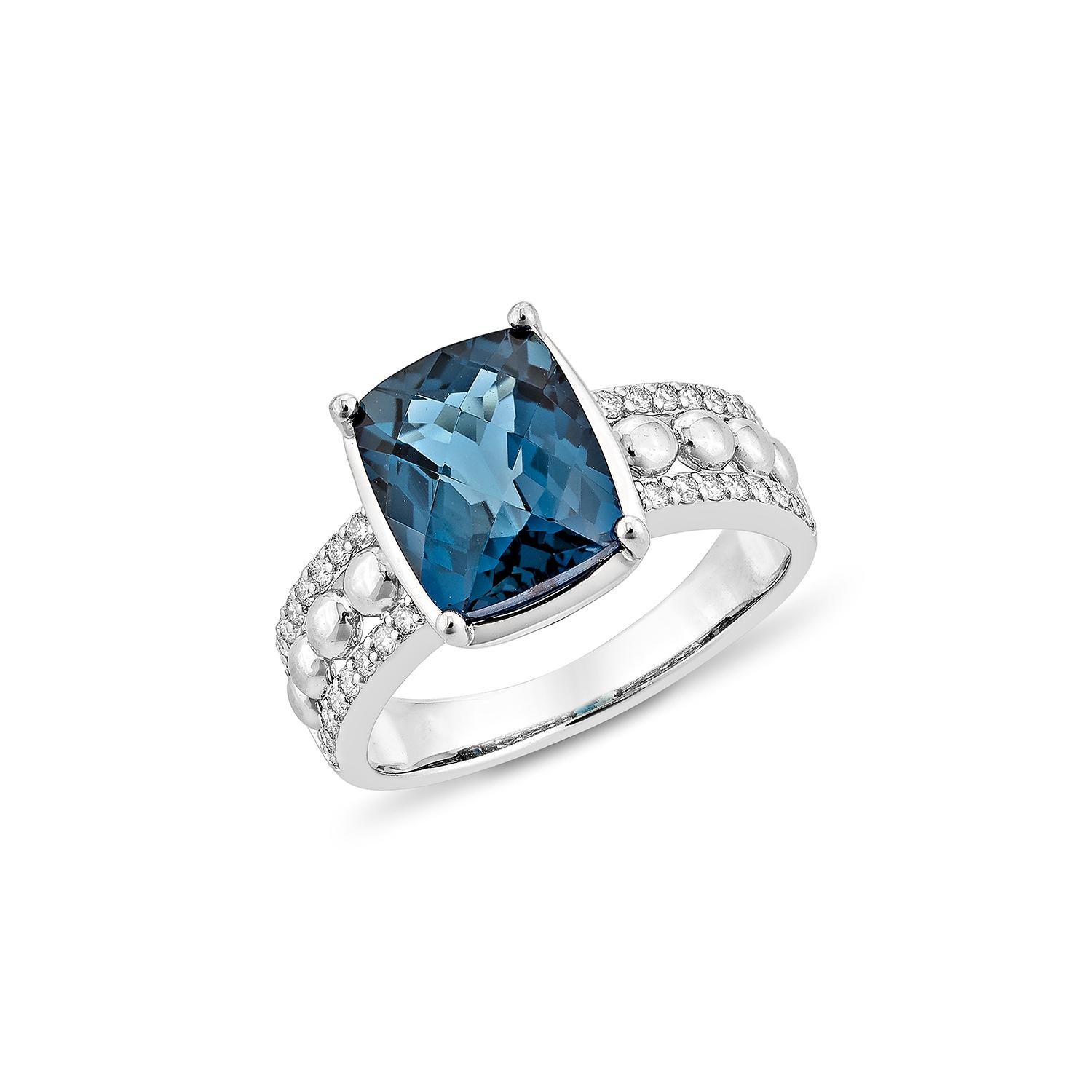 Contemporary 3.94 Carat London Blue Topaz Fancy Ring in 18Karat White Gold with Diamond. For Sale