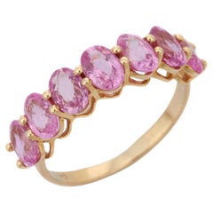 3.94 ct Oval Pink Sapphire Half Eternity Band Ring in 14K Yellow Gold 