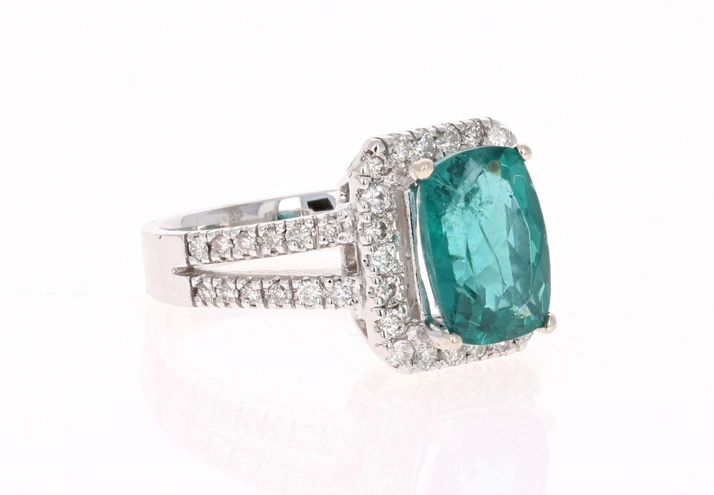 Stunning 3.95 Carat Apatite Diamond White Gold Cocktail Ring that is sure to elevate your accessory collection or it can even be a great substitute for a promise Ring!

The ring has a 3.36 carat Apatite set in the center of the ring surrounded by 46