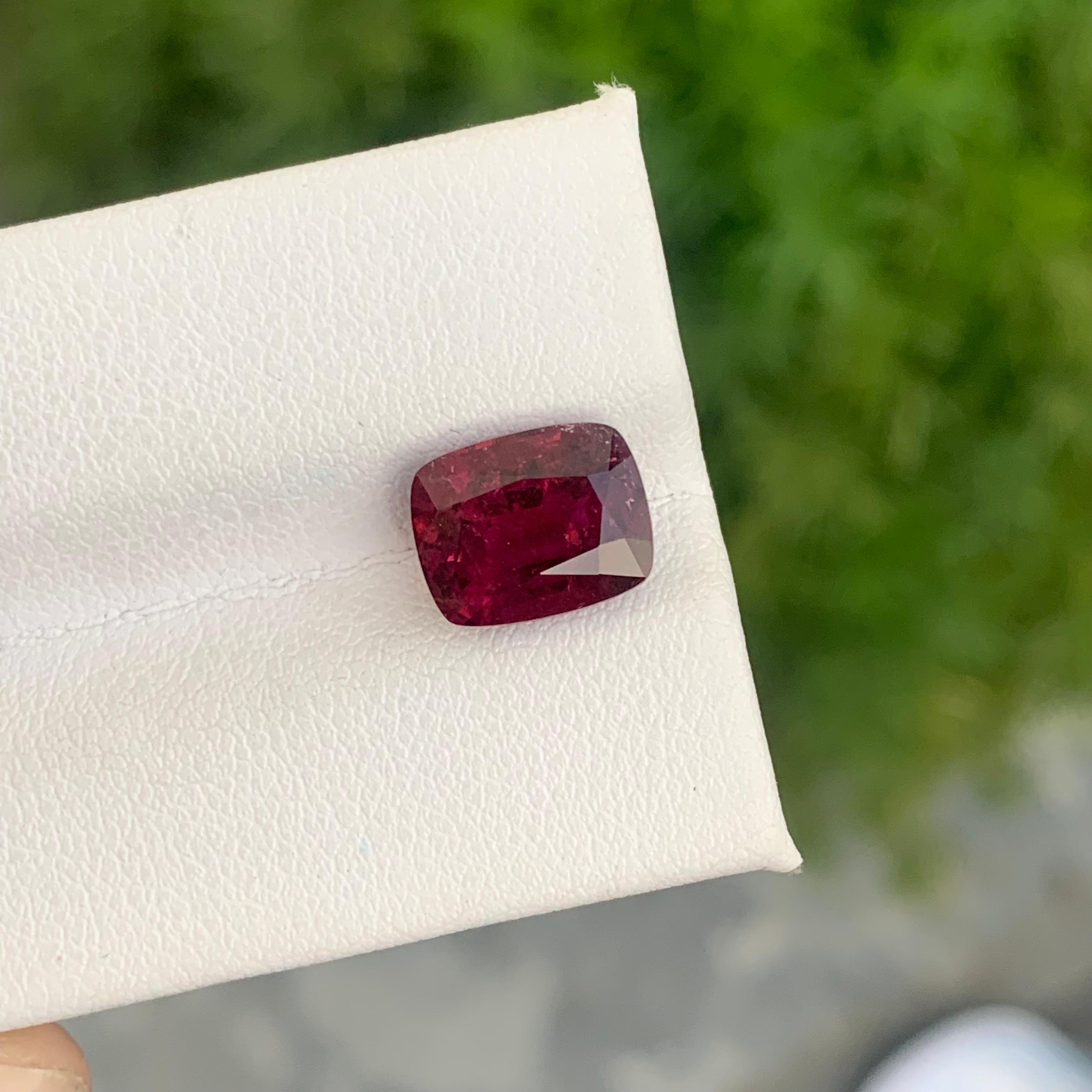 Gemstone Type :  Rubellite Tourmaline
Weight : 3.95 Carats
Dimensions : 10x8x6.1 Mm
Origin : Africa 
Clarity :  SI
Shape: Cushion
Color: Pink Red
Certificate: On Demand
The rubellite is a transparent gemstone from the colorful family of the