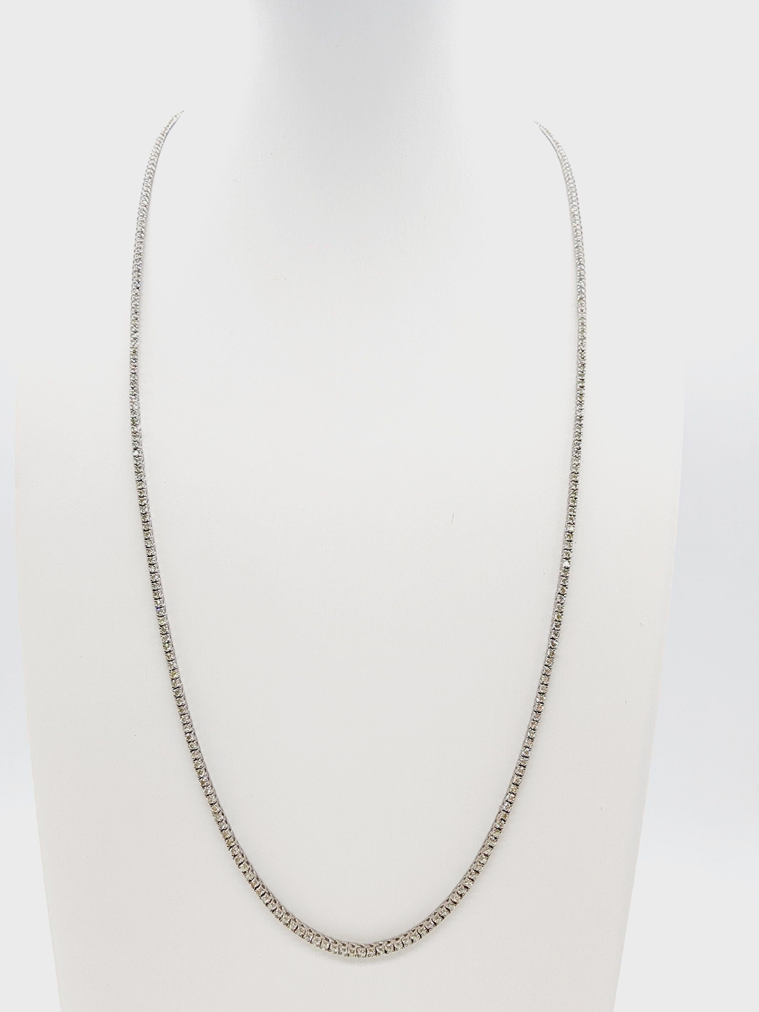 Beautiful quality tennis necklace, round-brilliant cut white diamonds clean and excellent shine!

Carat Weight: 3.95 cts
14k solid white gold
Style: Classic four-prong style for maximum light brilliance. Length: 20 inch 
Average Color: I-J
Average