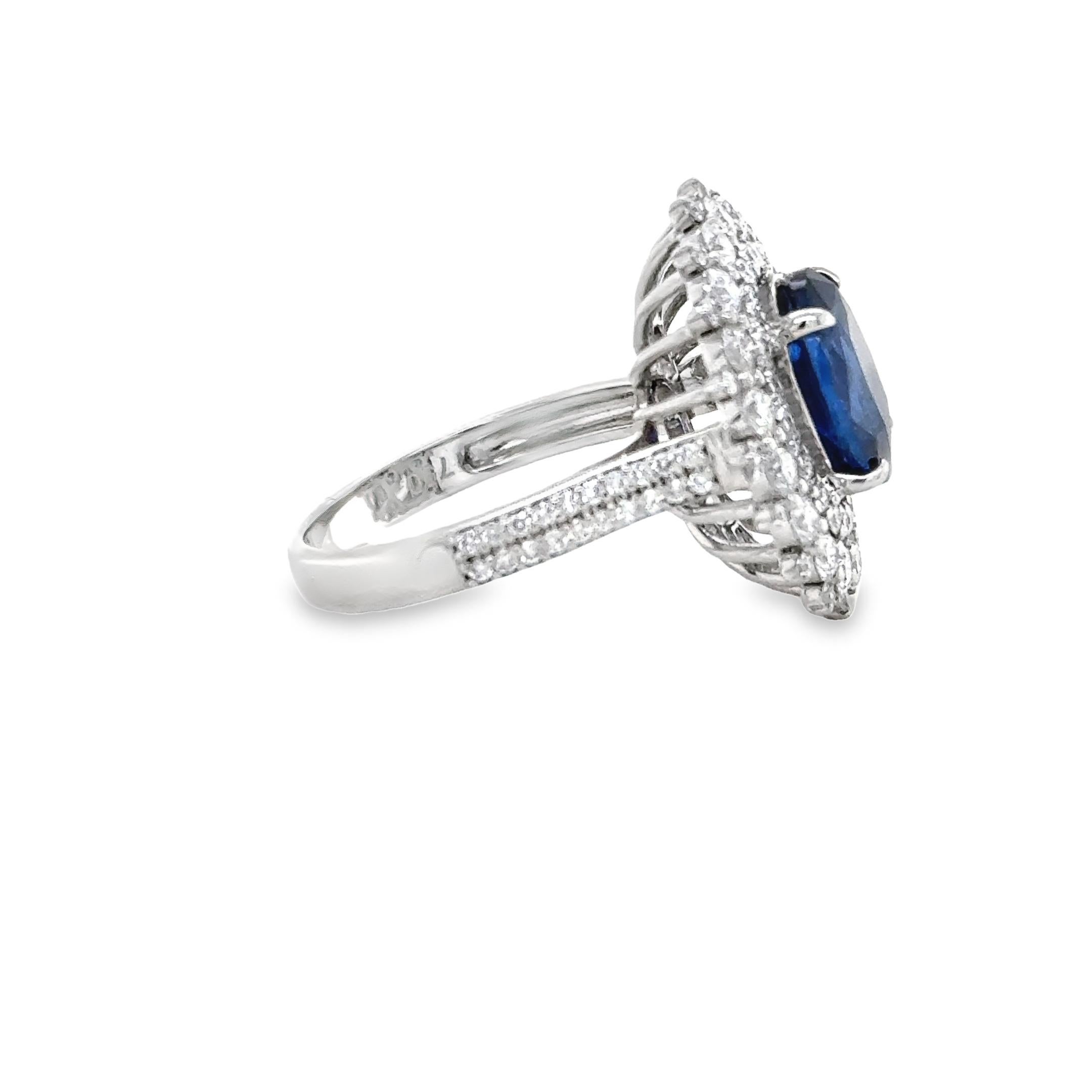 Oval Cut 3.95 Carat Royal Blue Oval Sapphire & Diamond Cluster Ring For Sale