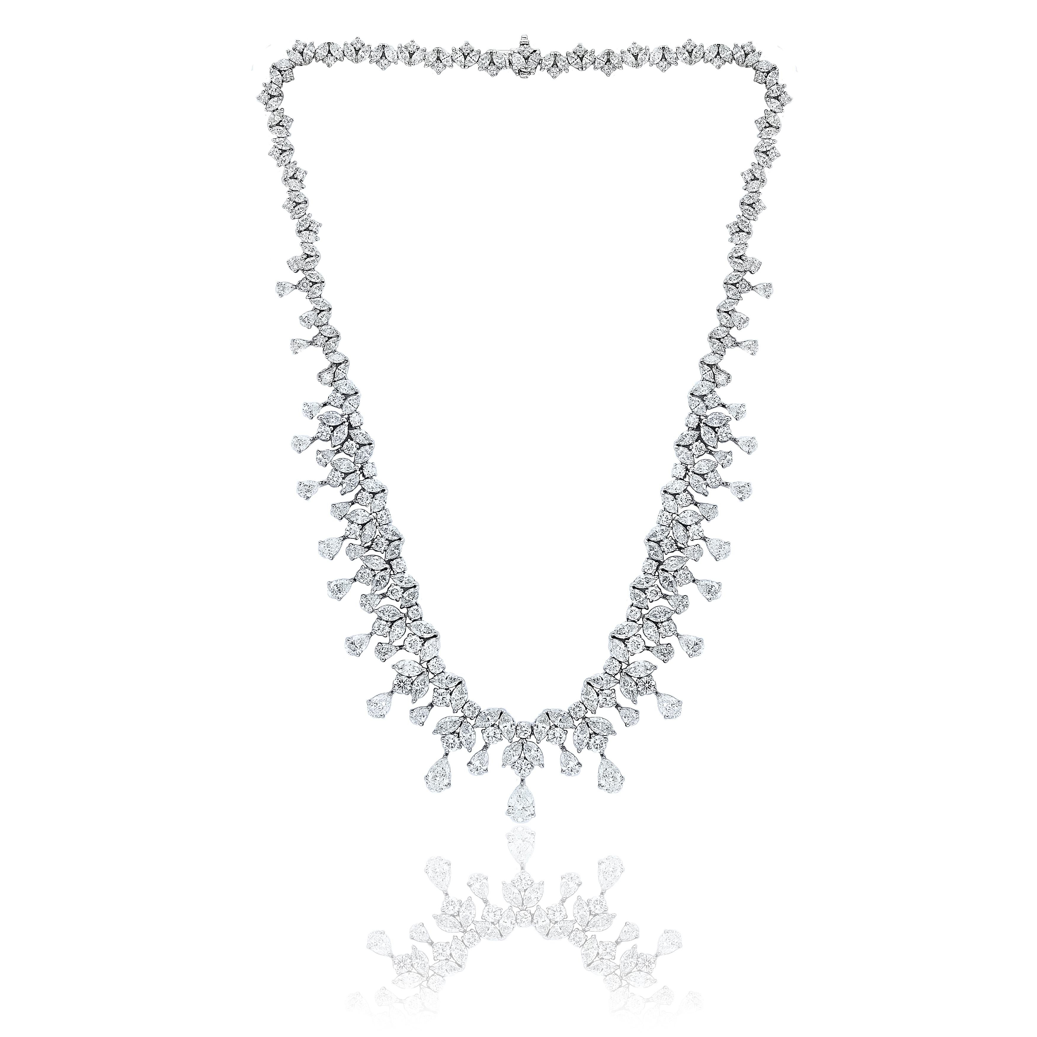 An important and brilliant necklace showcasing 43.23 carats of mixed cut diamonds, set in an intricate and fringe design. Made in 18 karats white gold. Intricate and creative design, one-of-a-kind piece.

Style available in different price ranges.