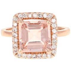 Bague de fiançailles en or rose avec morganite et diamants