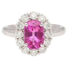 3.96 Carat Oval Cut Pink Sapphire and Diamond Halo Ring in 18k White Gold