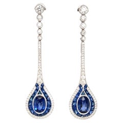 Boucles d'oreilles pendantes en saphir ovale et diamant de 3,96 ct