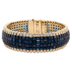 Retro 39.62 Carat Blue Sapphire and 6.2 Carat Diamond Bracelet in 18 Karat Yellow Gold