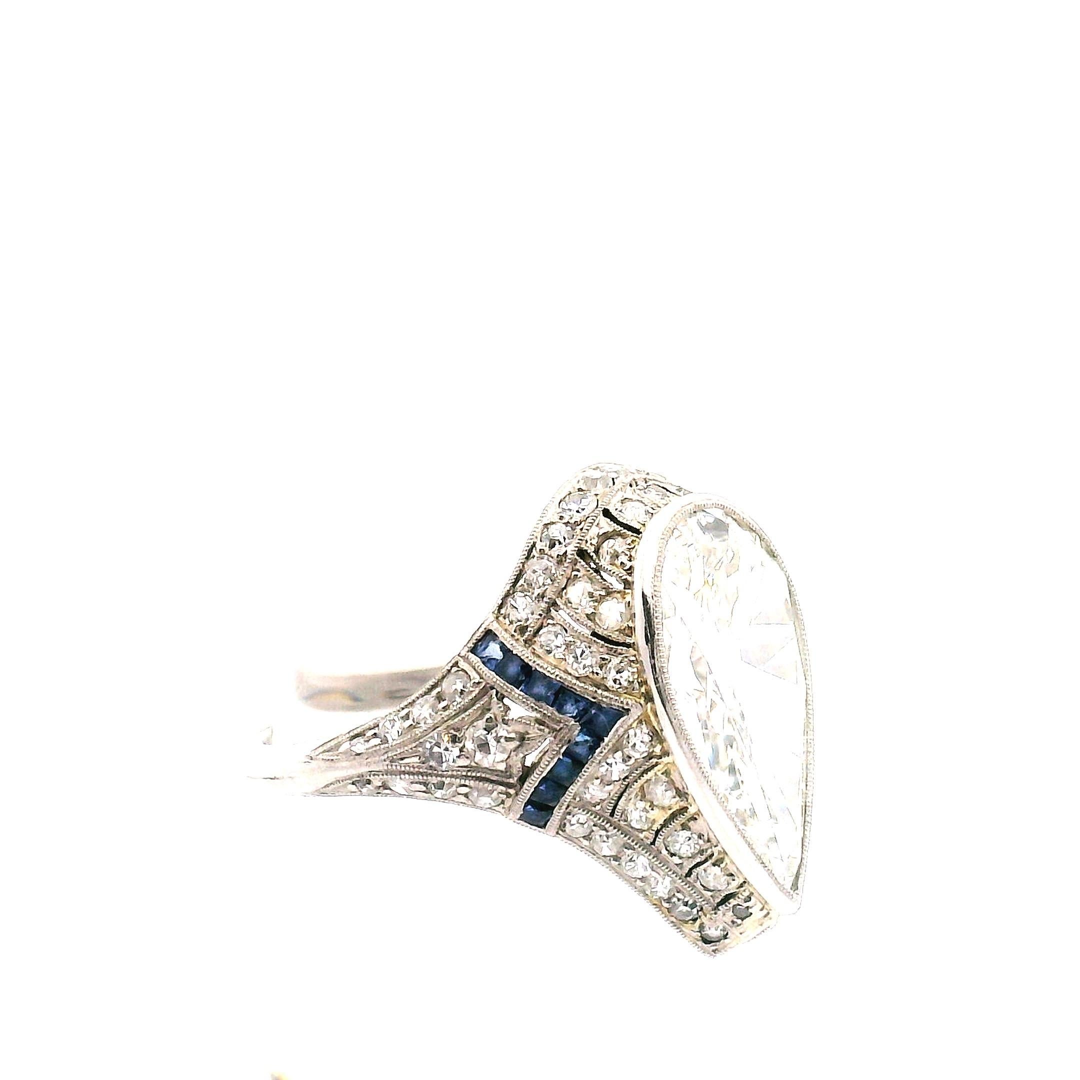 Une rare opportunité de posséder une bague filigrane en diamant de Ryrie BROS. L'entreprise était la bijouterie la plus élaborée du Canada à Toronto. 
fin du 19e et début du 20e siècle.   Composé de 
Diamant poire de 3.96ct 

Le degré de clarté est