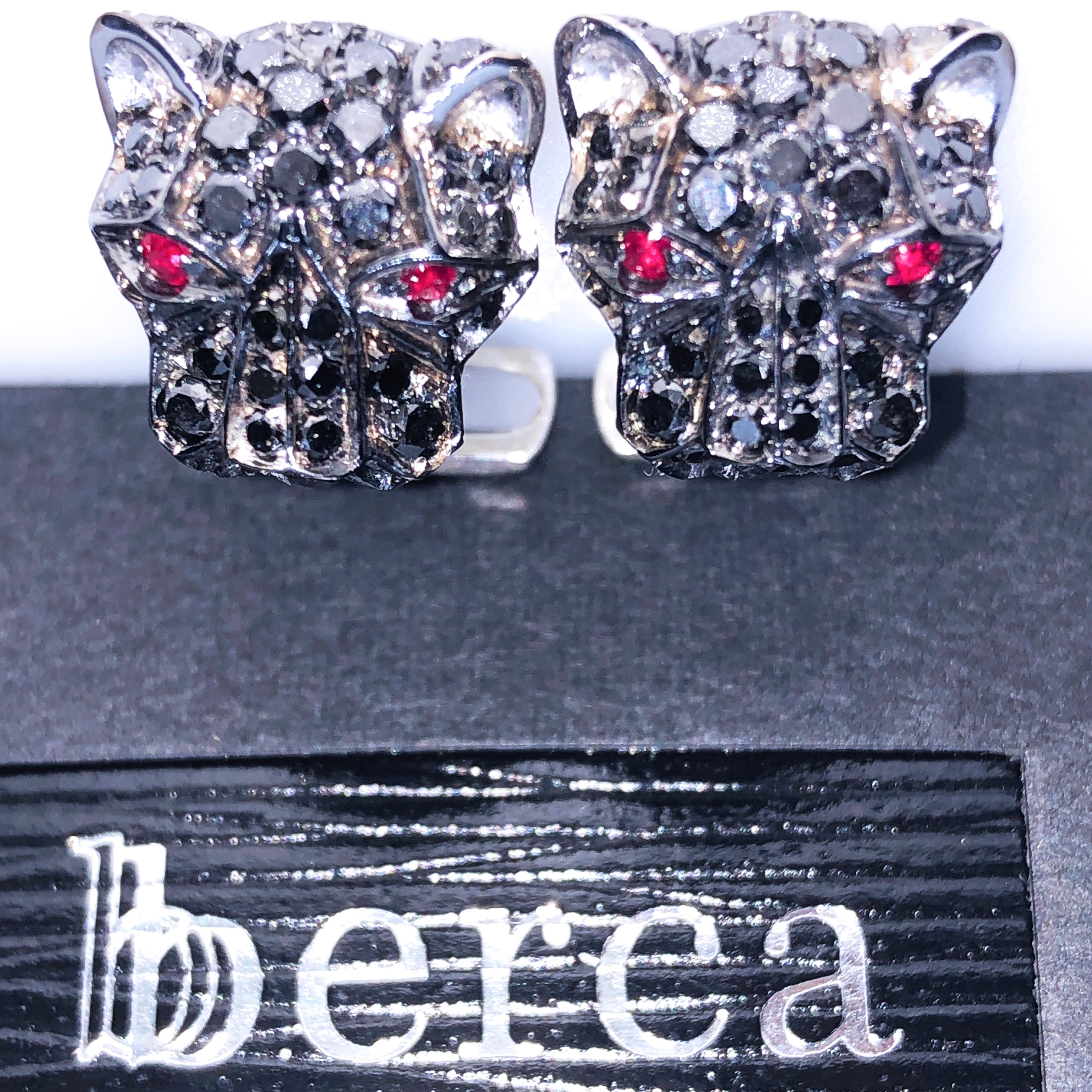 Awesome, Unique yet Timeless and Absolutely Chic 3.96 Carat Natural Black Diamond, 0.23 Carat Round Ruby Eyes Cougar Head Shaped, T-Bar Back, Black and White Gold Setting Cufflinks.
In our smart fitted black box and pouch.


