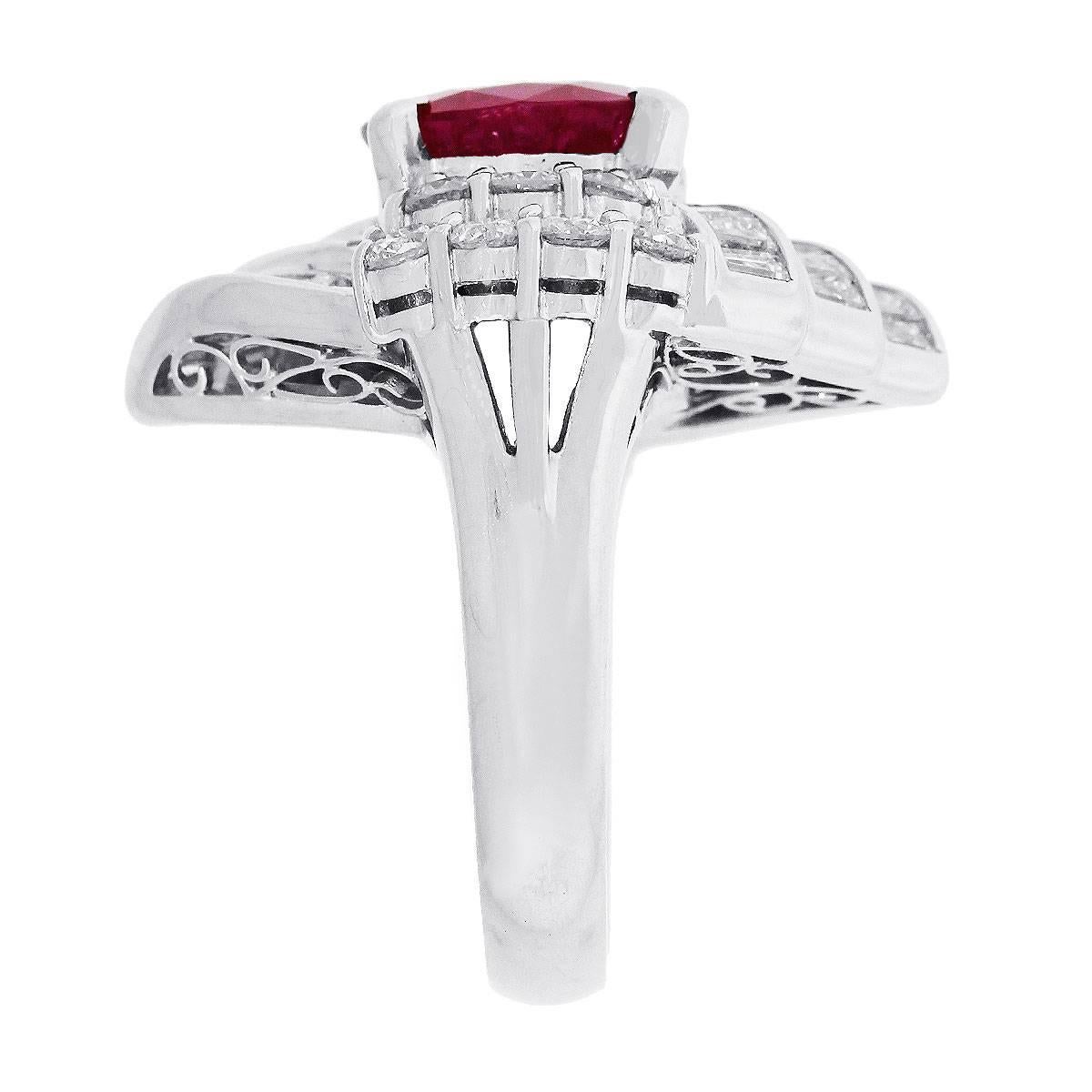 Material: Platinum
Gemstone Details: Approximately 3.97ct cushion cut ruby.
Diamond Details: Approximately 1.84ctw round brilliant and baguette shape diamonds. Diamonds are G/H in color and VS in clarity
Ring Size: 5.75 (can be sized)
Ring