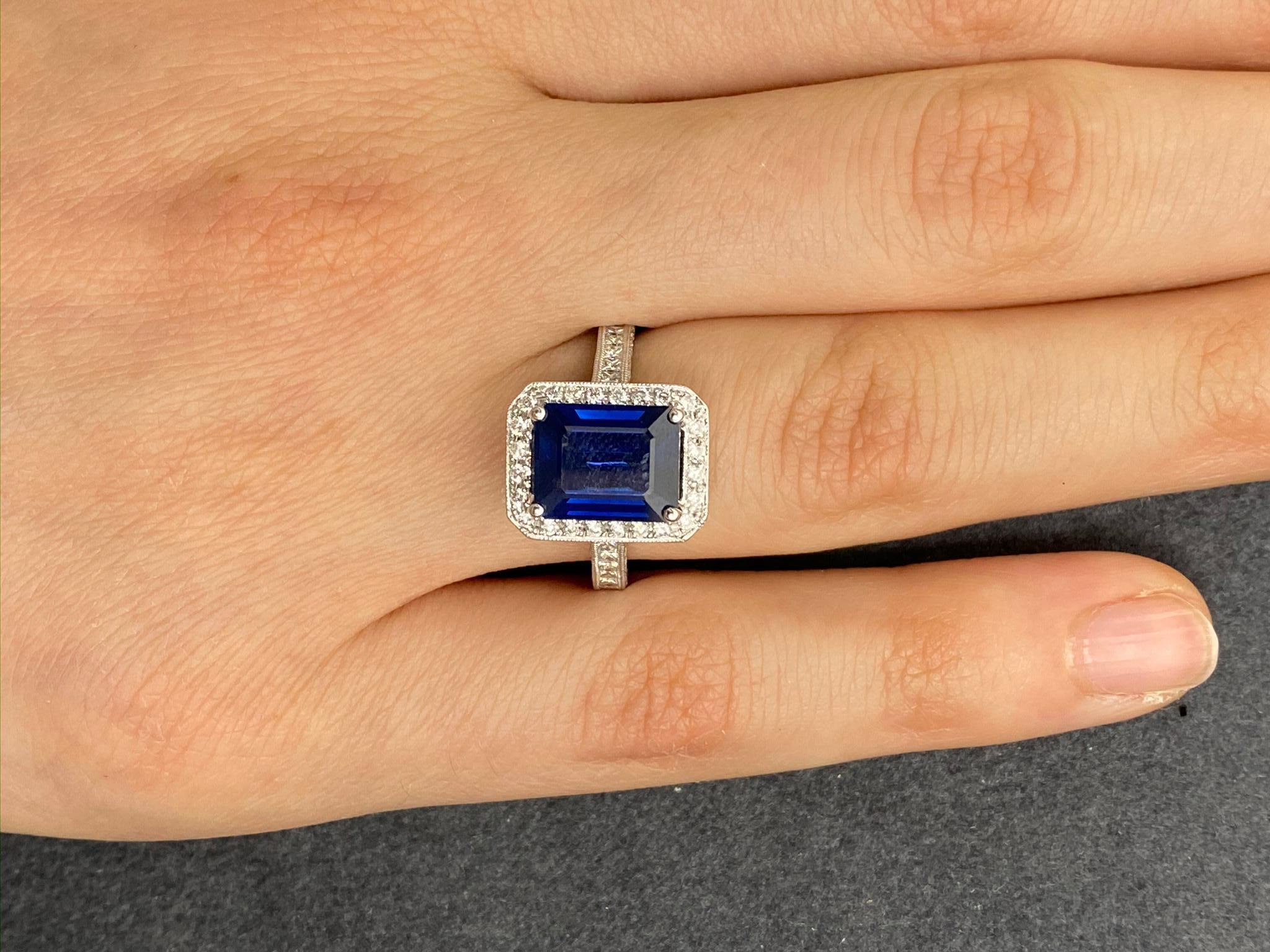 Women's 3.97 Carat Emerald Cut Sapphire and Diamond Ring For Sale