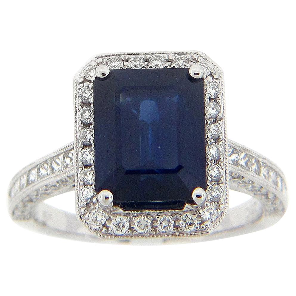 3.97 Carat Emerald Cut Sapphire and Diamond Ring For Sale
