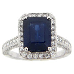 3.97 Carat Emerald Cut Sapphire and Diamond Ring