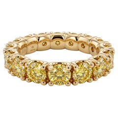3.97 Carat Fancy Vivid Yellow Diamond Eternity Band Ring in Yellow Gold