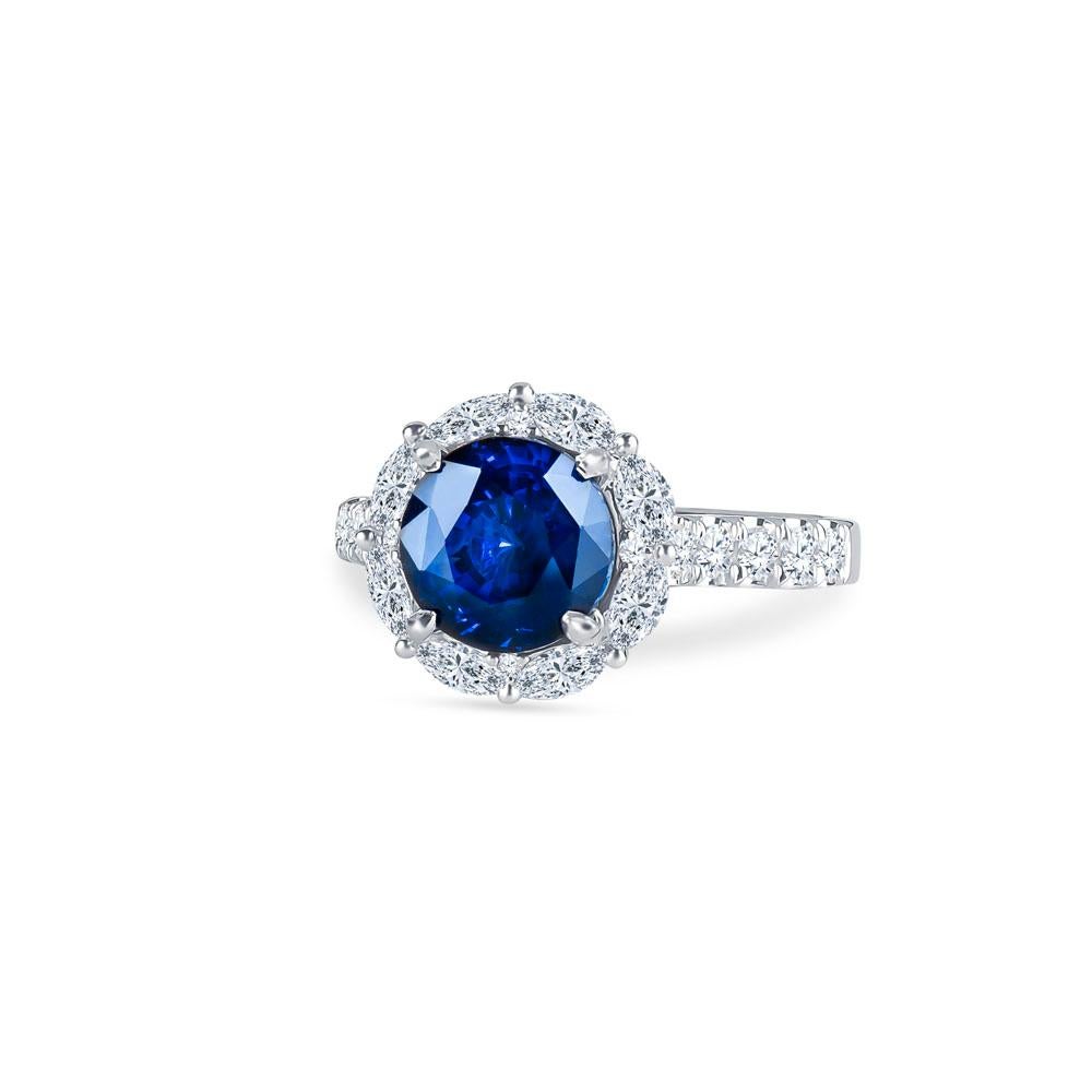 Round Cut 3.97 Carat GIA Round Natural Blue Sapphire Set in 18 Karat Diamond Halo Ring