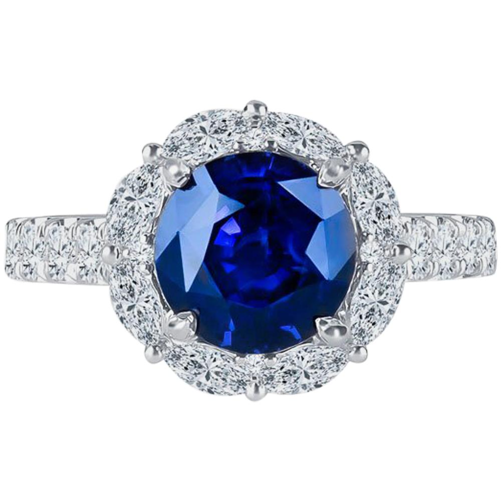 3.97 Carat GIA Round Natural Blue Sapphire Set in 18 Karat Diamond Halo Ring