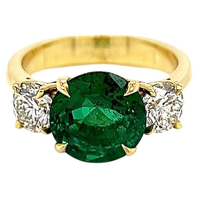 3,97 Gesamtkarat Smaragd und Diamant Drei Stein Damenring GIA