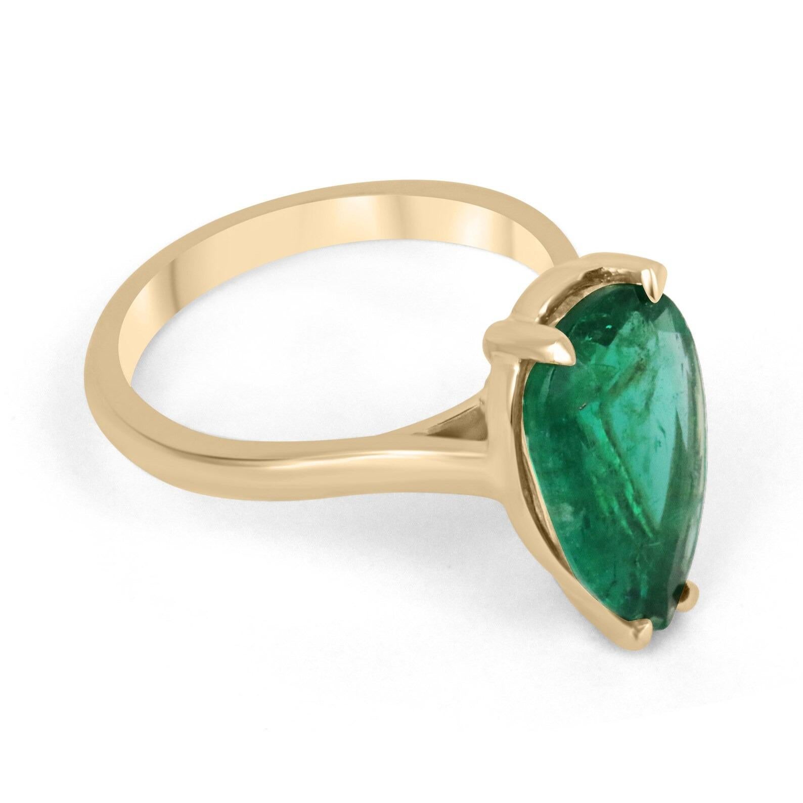 You have stumbled upon an absolute treasure, to say the very least. This remarkable solitaire emerald ring is one of one. Showcased is a ravishing natural pear cut emerald that displays the most vivacious rich green color and superb characteristics.